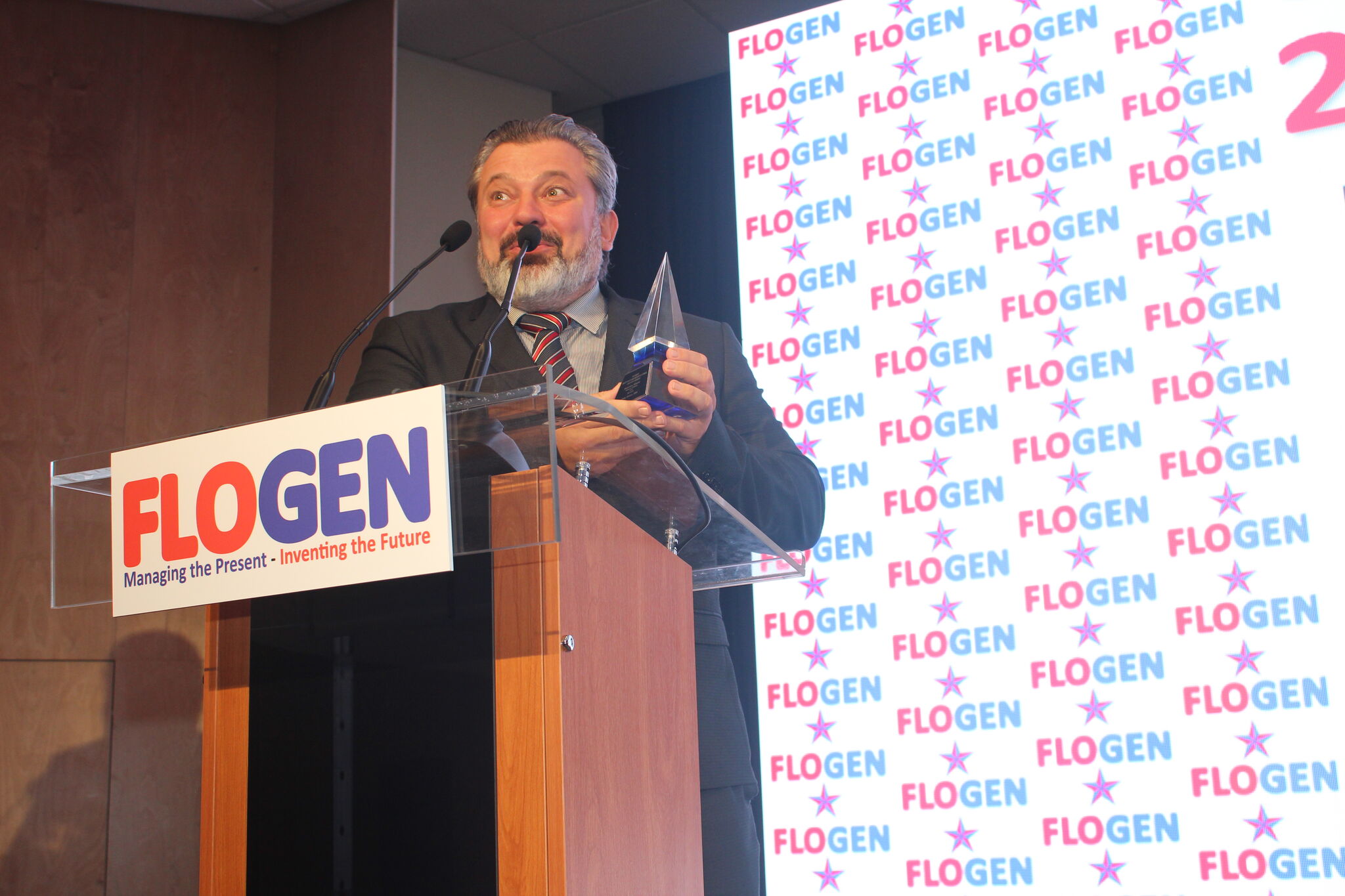 Mr. Branislav Klocok delivering an acceptance speech during the FLOGEN SIPS 2024 award ceremony