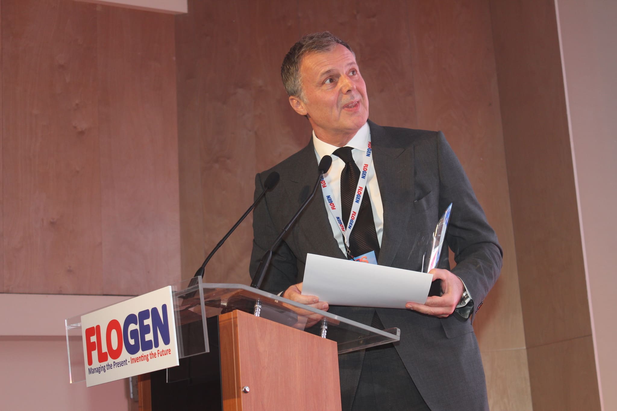 Mr. Burak Büyükfırat delivering an acceptance speech during the FLOGEN SIPS 2024 award ceremony