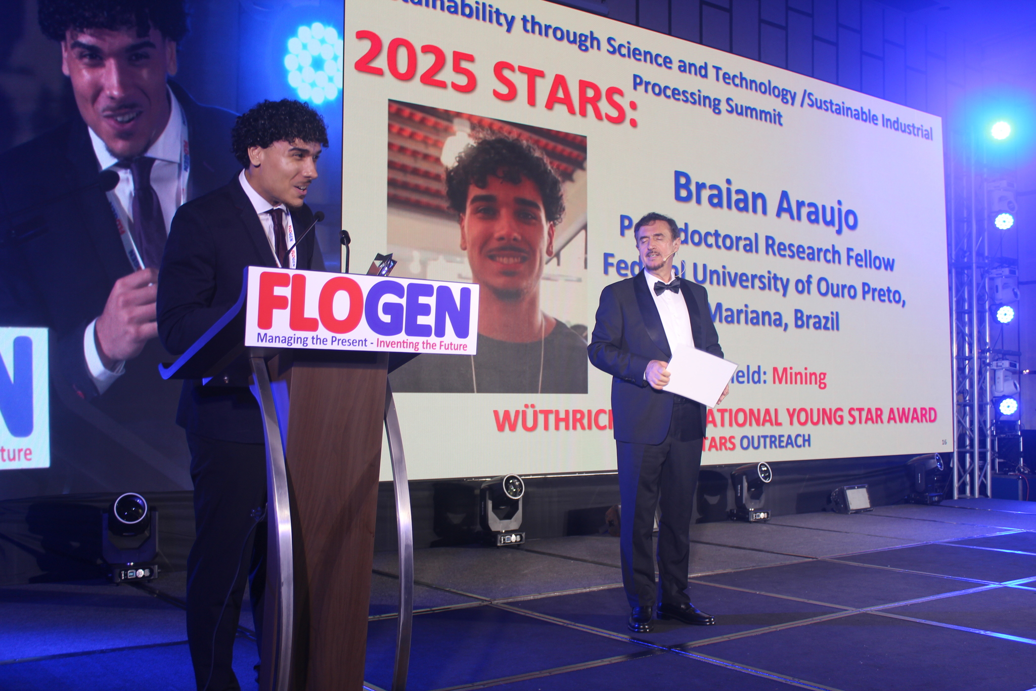 Mr. Braian Araujo delivering an acceptance speech during the FLOGEN SIPS 2025 award ceremony