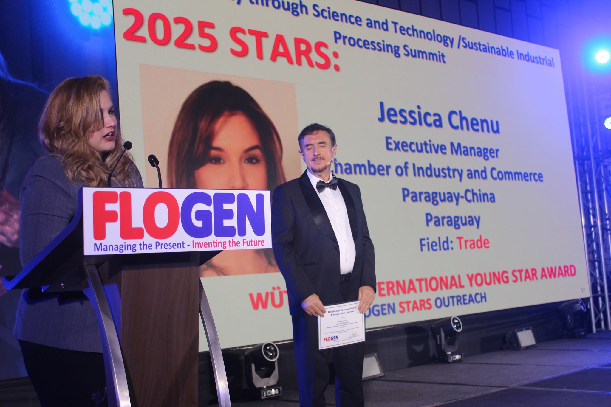 Ms. Jessica Chenu delivering an acceptance speech during the FLOGEN SIPS 2025 award ceremony