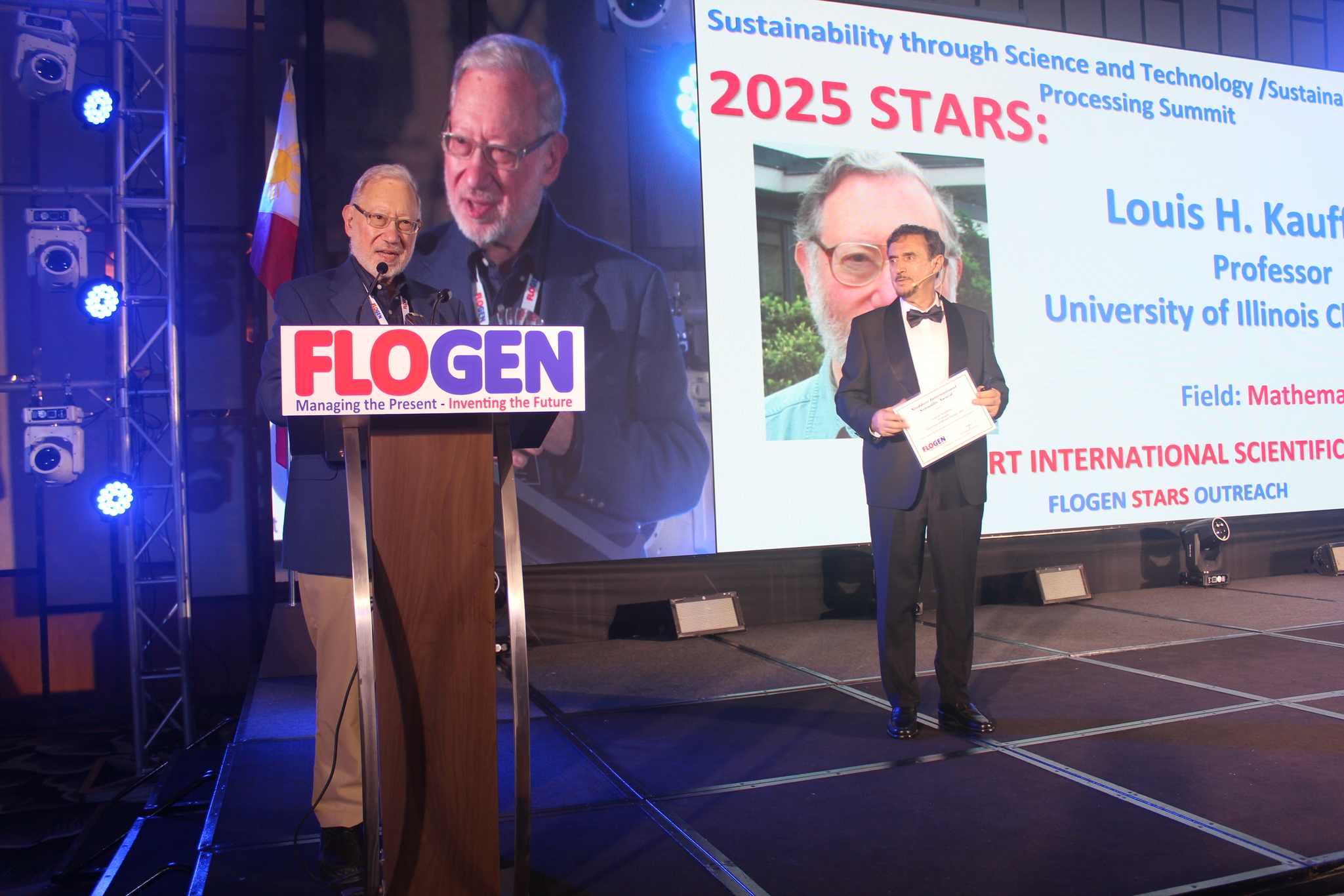 Dr. Louis Kauffman delivering an acceptance speech during the FLOGEN SIPS 2025 award ceremony