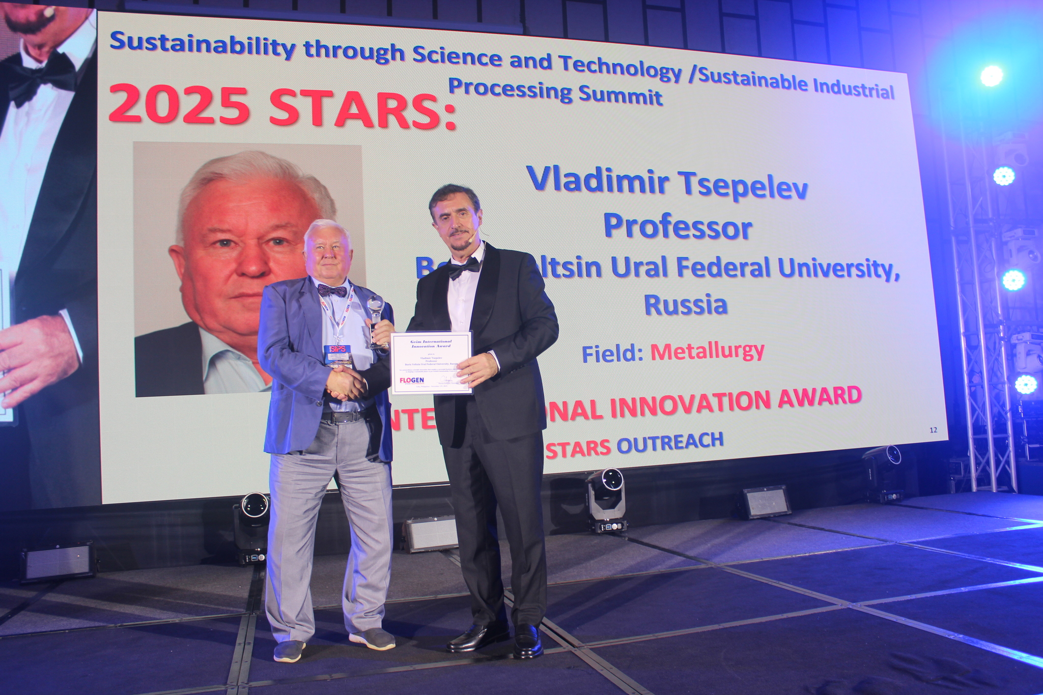 Dr. Vladimir Tsepelev receiving the Geim International Innovation Award from Dr. Florian Kongoli at FLOGEN SIPS 2025