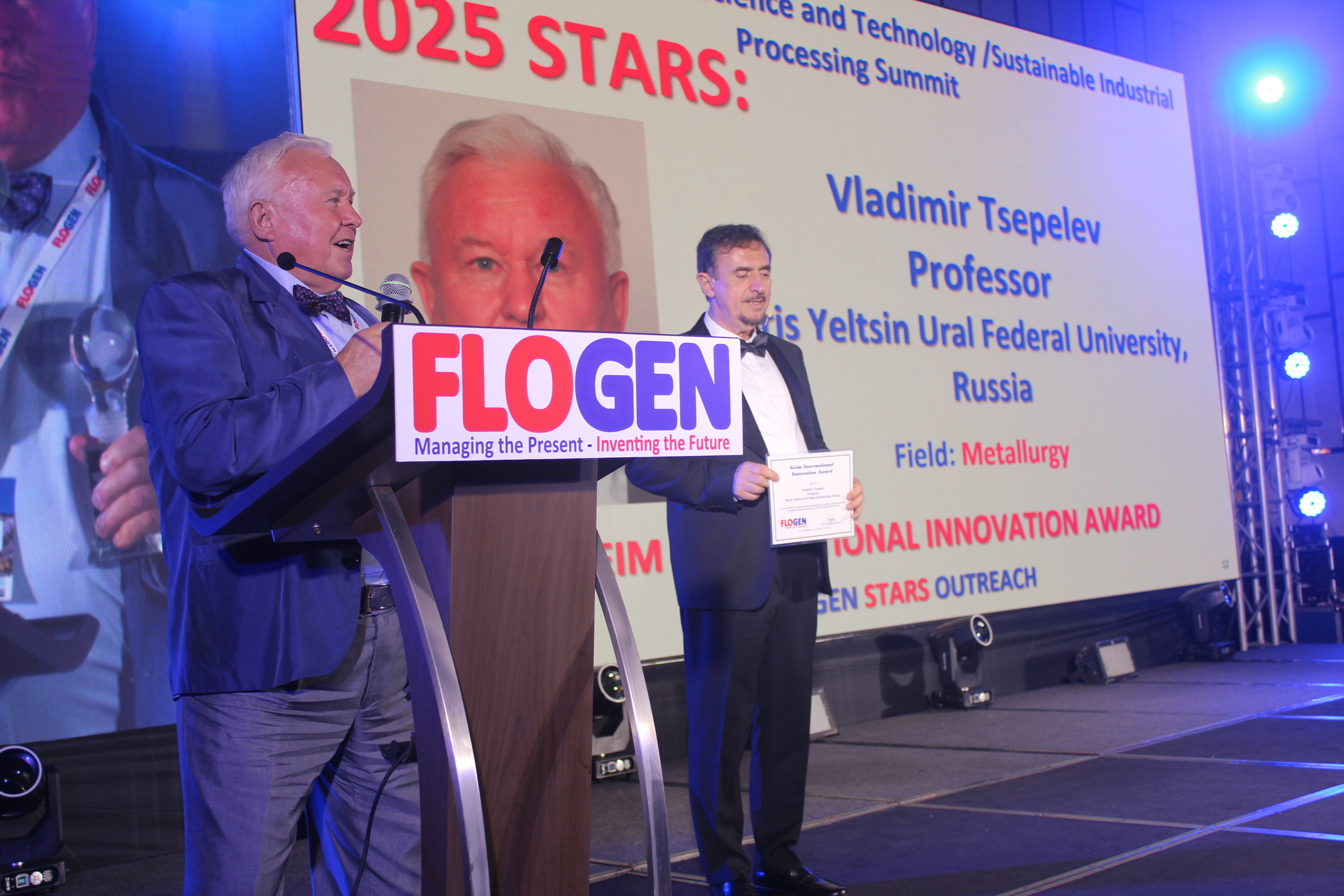 Dr. Vladimir Tsepelev delivering an acceptance speech during the FLOGEN SIPS 2025 award ceremony